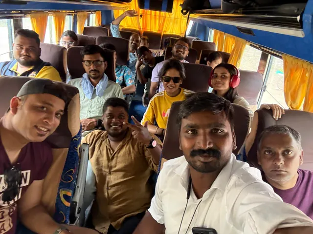 Team selfie on the bus during a company outing